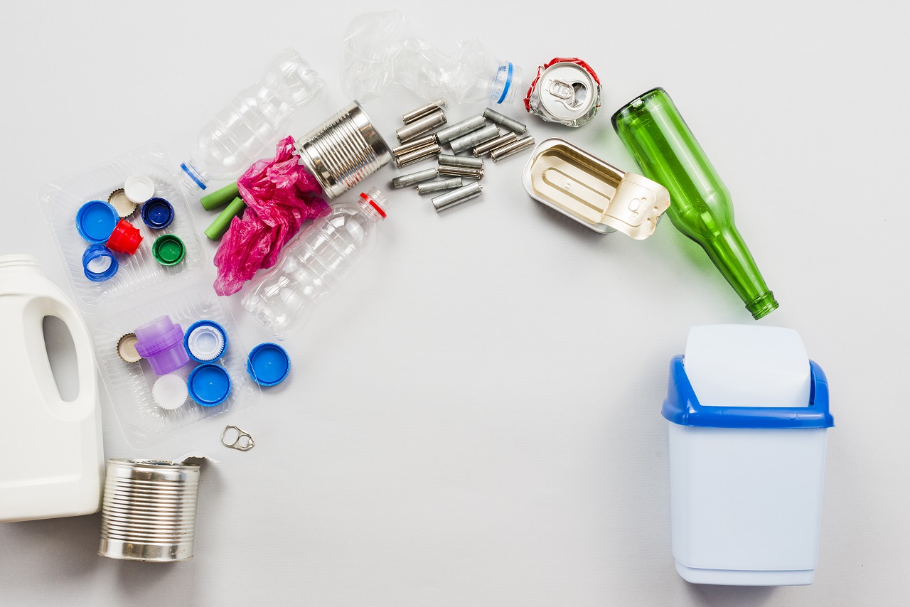 Trash arranged to be thrown in a trashcan