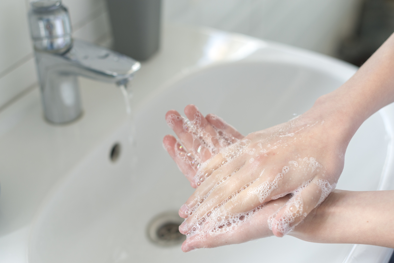 Close up of someone washing their hands