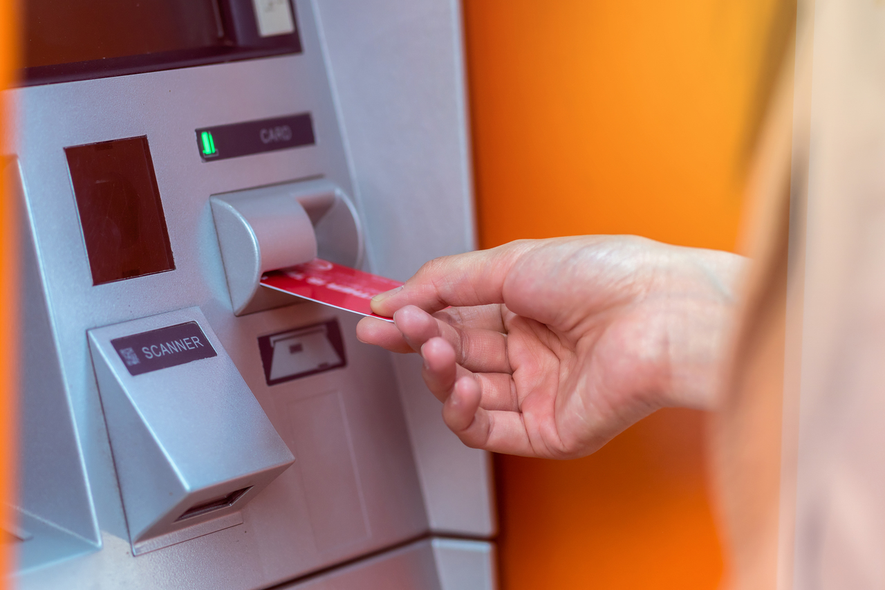 A woman withdrawing money