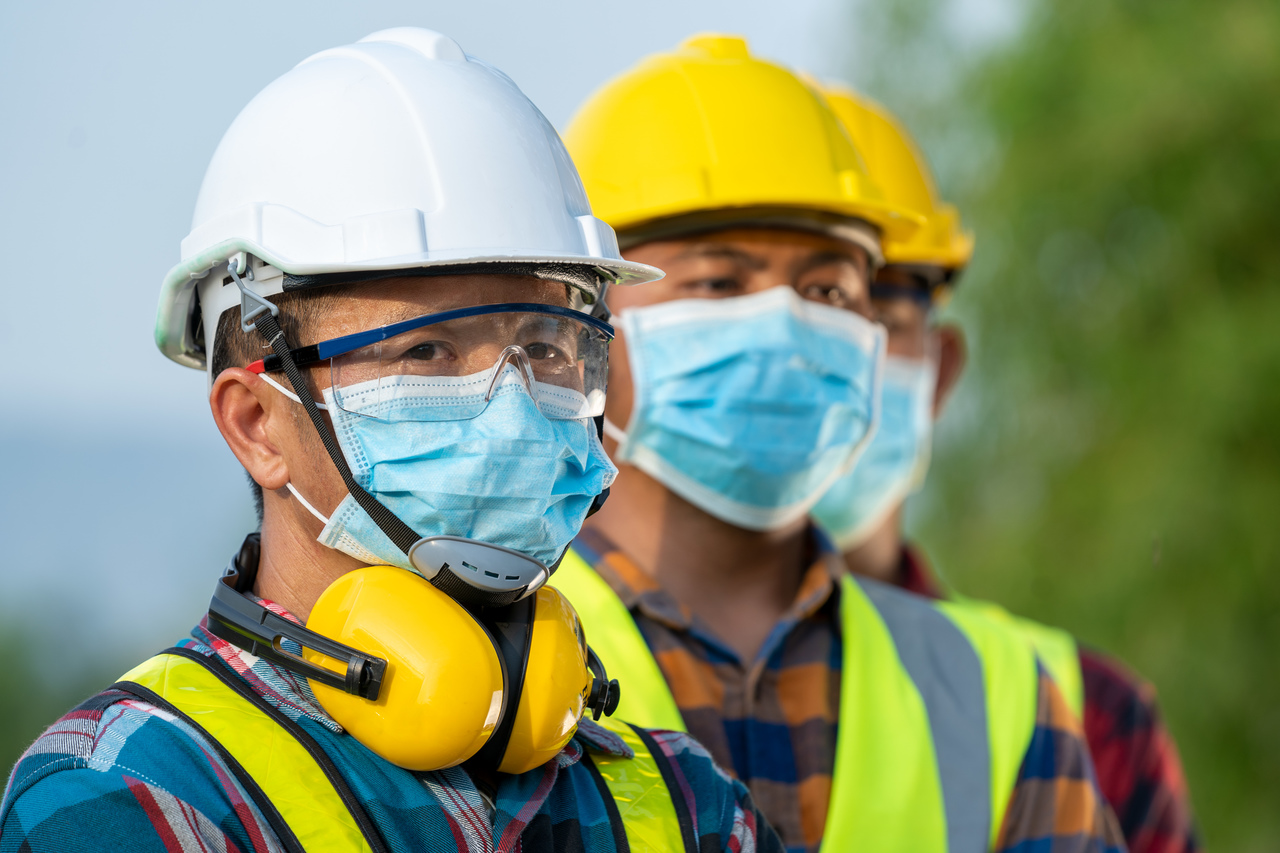 Employees wearing protective gear