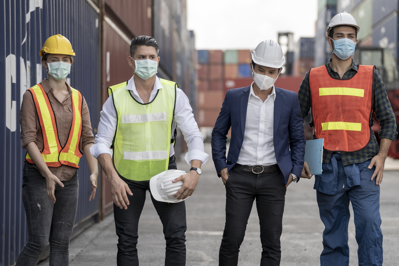 Warehouse workers in PPE